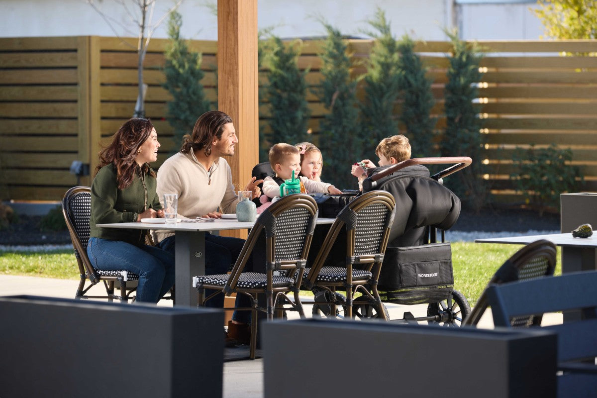 three kids enjoying versatile facing seats in the W4 Luxe Pro Stroller Wagon