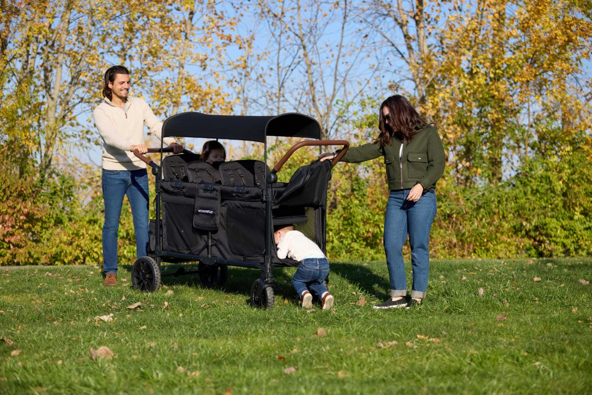 Mom utilizes zippable front wall for children for easy access